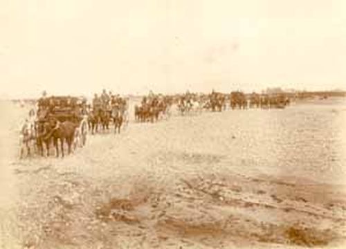 Drays transferring passengers accross the Ashley River, 1902