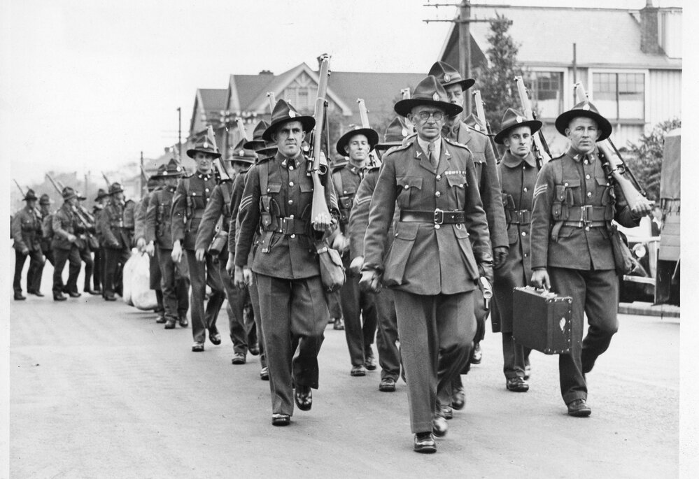 Territorials leaving for camp. Marching through the streets