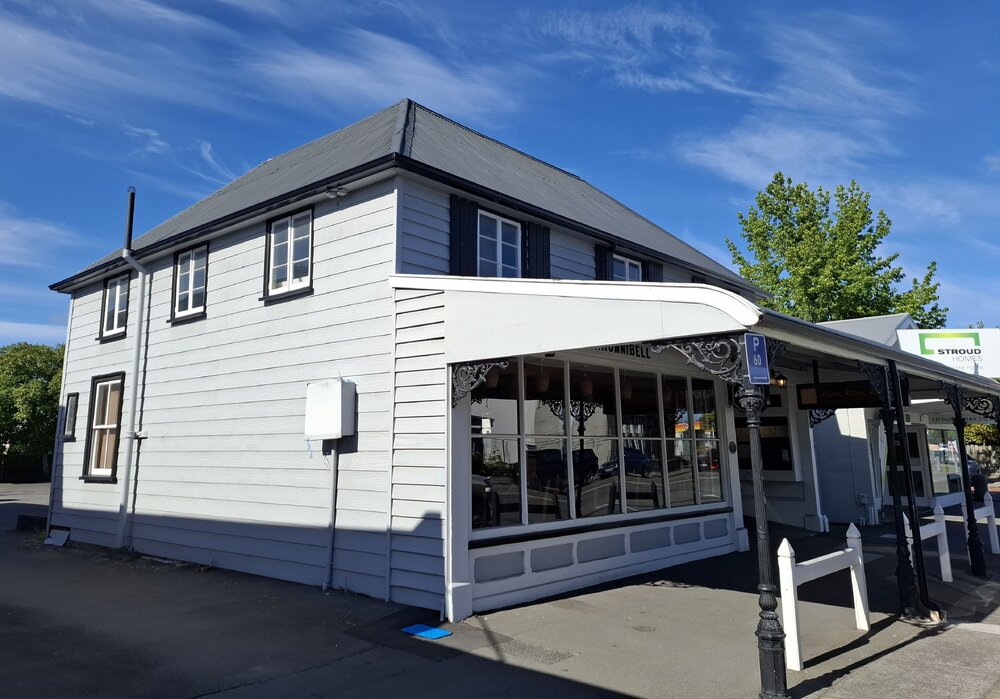 Hunnibell's building housing Nomnom Kitchen restaurant, High Street, Rangiora 2024