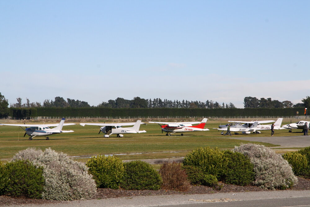 A group of small planes at Rangiora Airfield, 2015