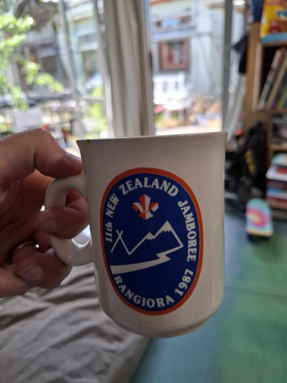 A commemorative mug from the 11th New Zealand Scout Jamboree, Rangiora, 1987