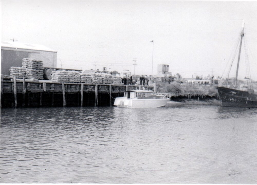 Kaiapoi Wharf - grain awaiting shipping and the Tuhoe, 1963