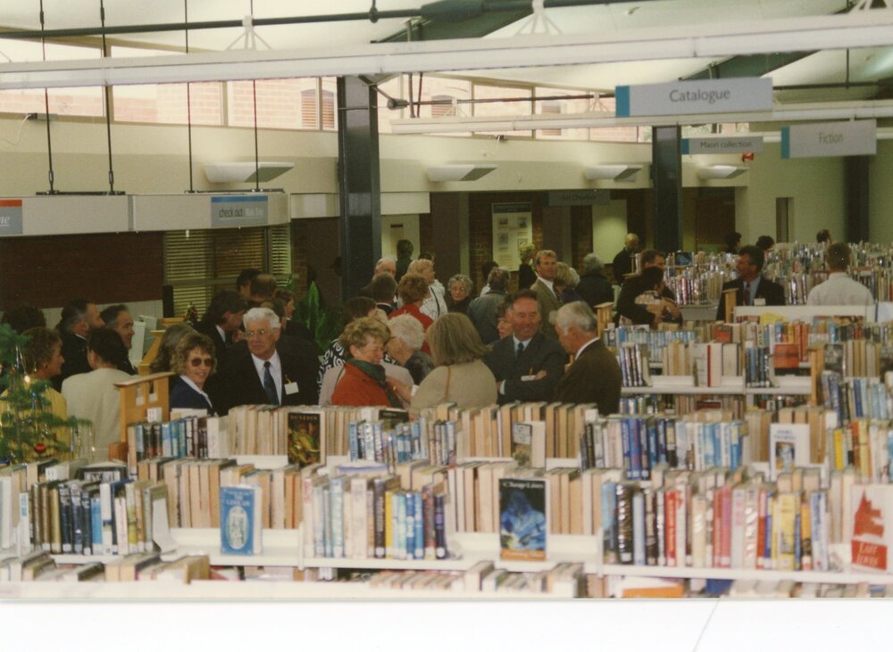 Crowds of people in the Trevor Inch Memorial Library on opening day, 21 December 1996