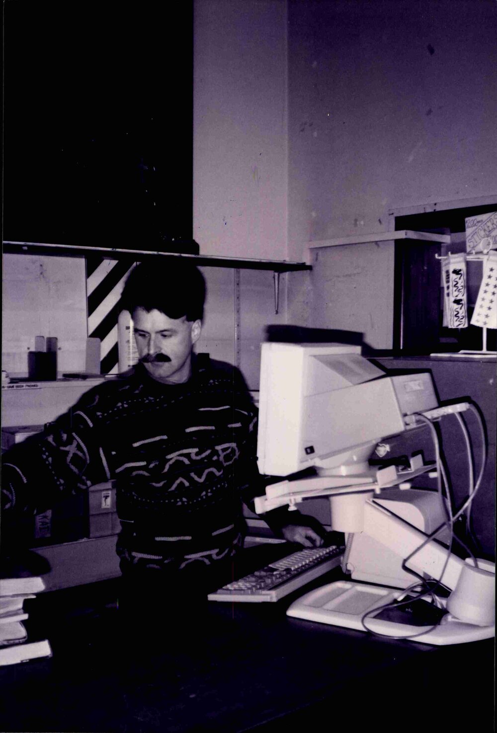 Librarian Richard Shepherd at work in the old Rangiora Public Library, c. 1996