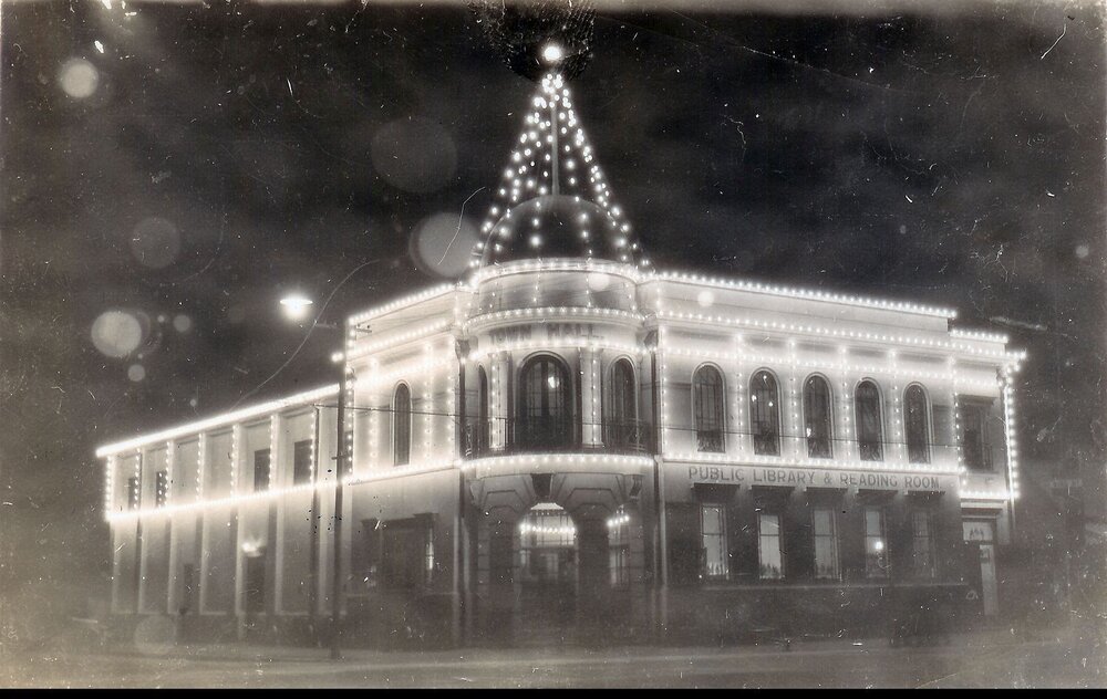 Rangiora Town Hall illuminated for celebrations, c. 1950