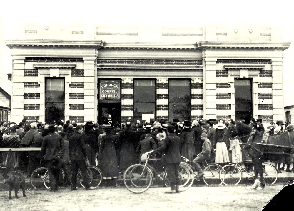 Rangiora mayor addressing a crowd in front of the Borough Council Chambers, c. early 1900s