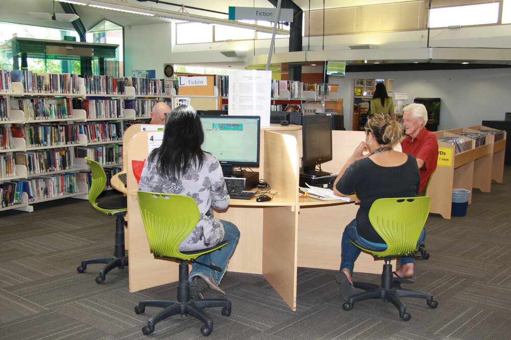 Library visitors using the APNK public computers at the Trevor Inch Memorial Library, 26 March 2014