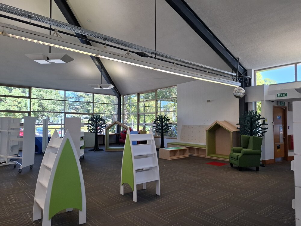 New shelving and fittings being installed in the Trevor Inch Memorial Library children's area, 21 March 2025