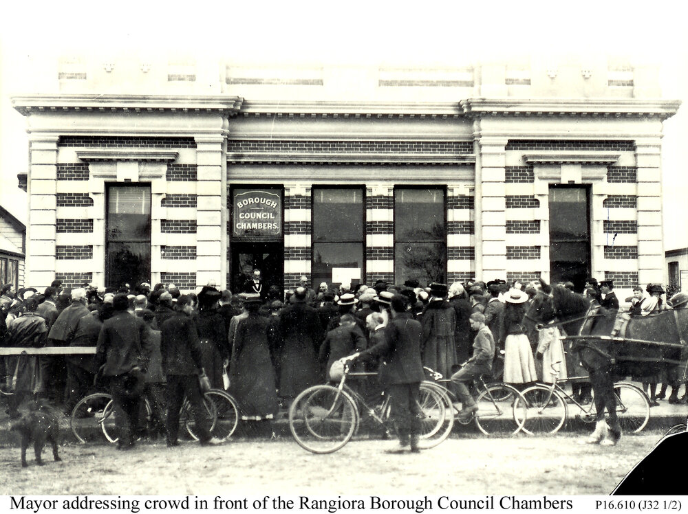 Mayor addressing crowd in front of the Rangiora Borough Council Chambers 
