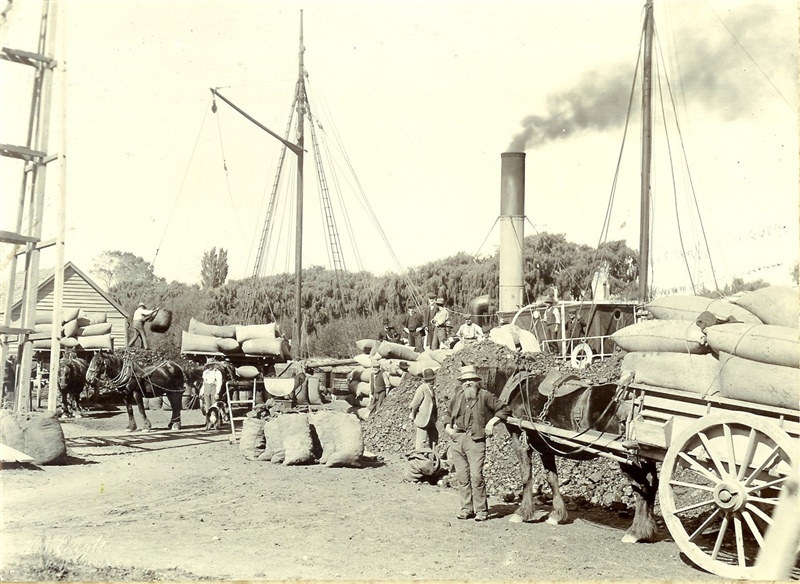 Loading shipments onto the WOOTTON vessel, Kaiapoi