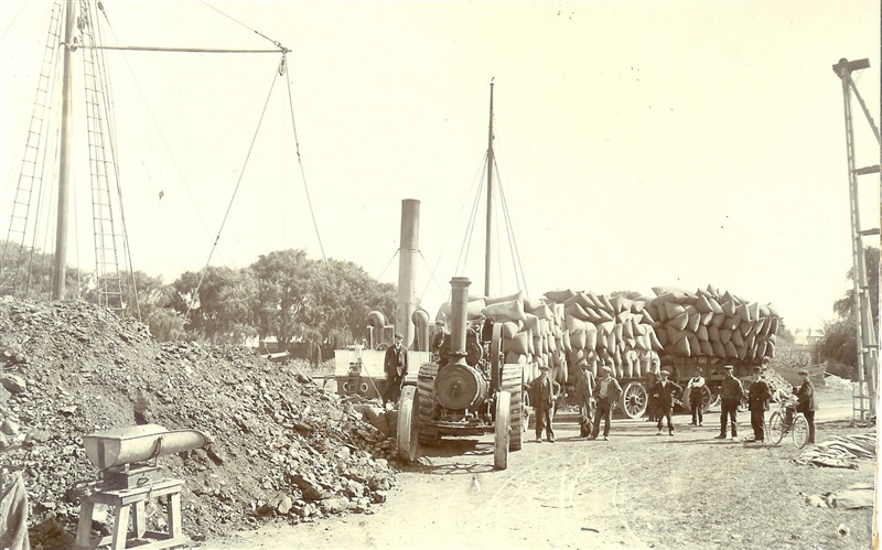 Loading grain at Kaiapoi Wharf, Kaiapoi N.Z.