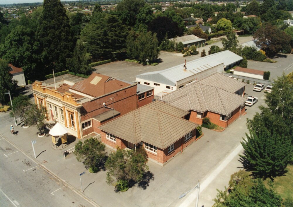 Aerial view of Rangiora Public Library, Rangiora police Station and Council sheds