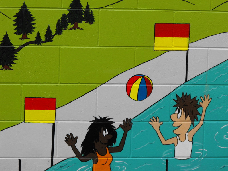 Safe Community mural swimming between the flags - Kaiapoi Library 