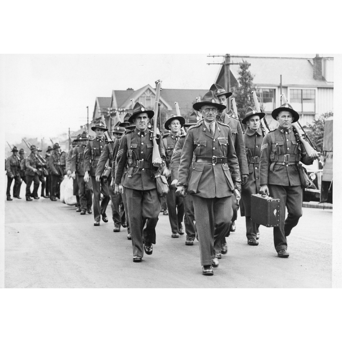 Territorials leaving for camp. Marching through the streets