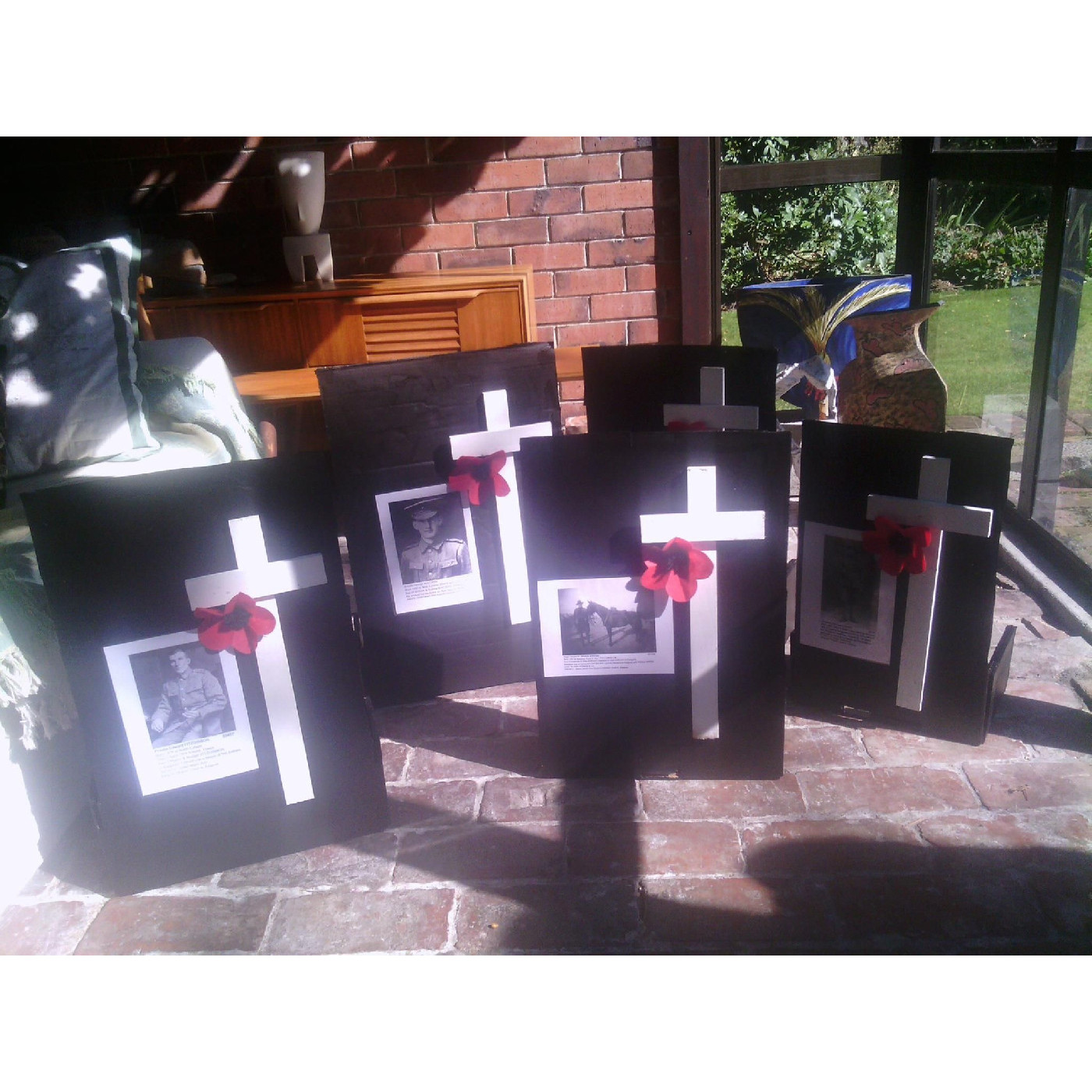 WWI soldiers photos on display in shop windows, Rangiora, 2018