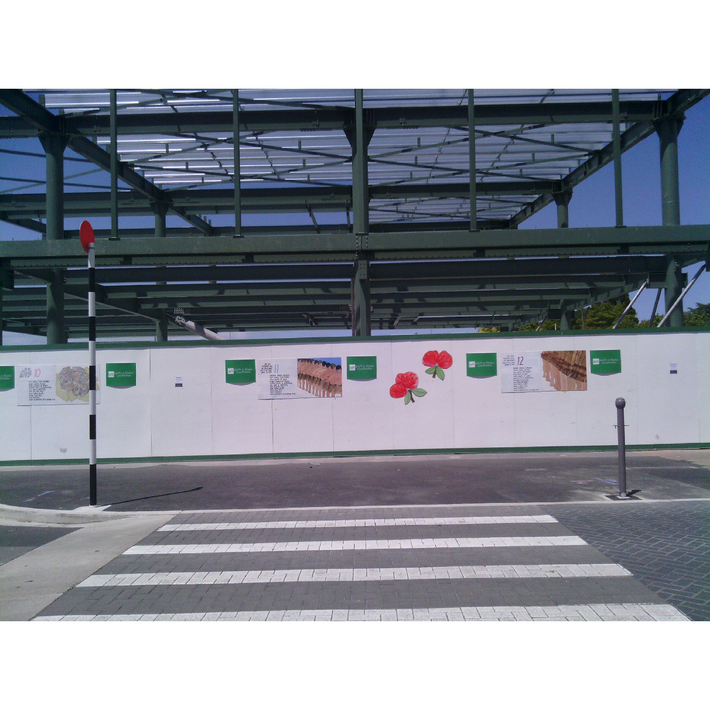 Illustrations from "A Pukeko in a Ponga Tree"  by Kingi M. Ihaka, on protective fencing, High Street, Rangiora, 2014 
