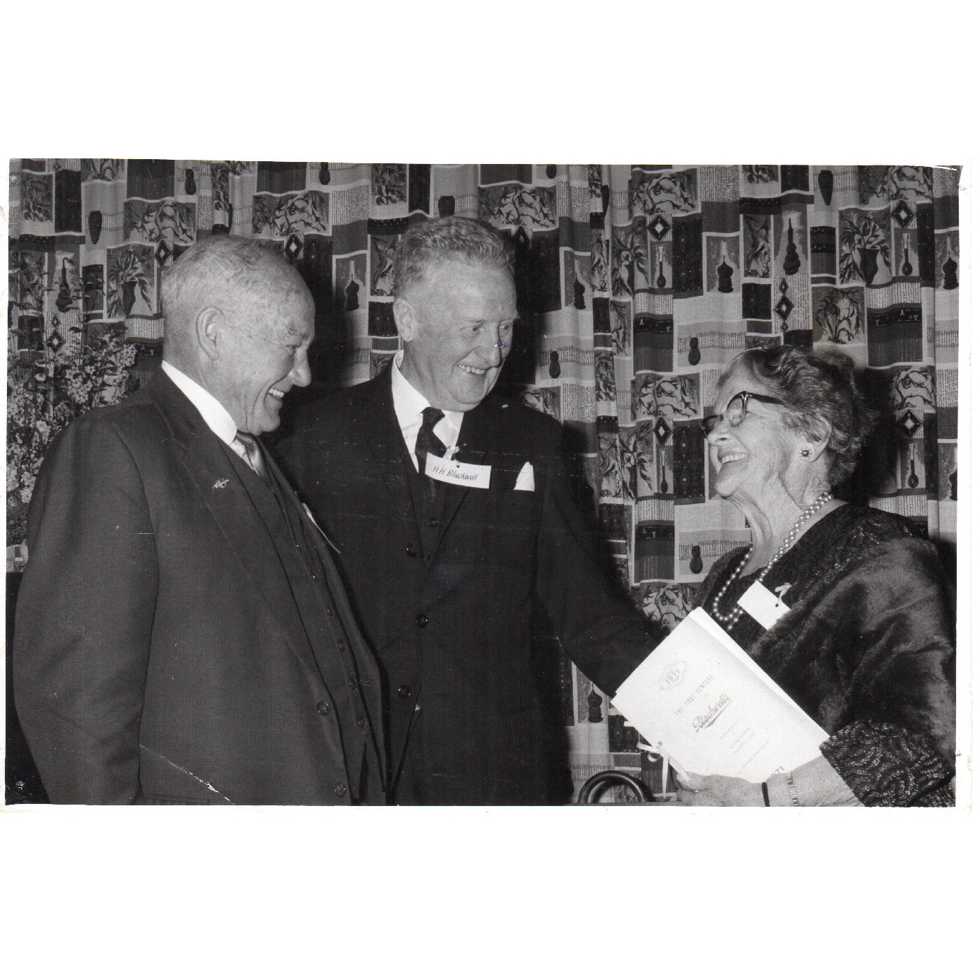Mr. H. H. Blackwell (centre), with early staff  members, Mr Gilbert Hirst and Mrs Estelle Evans