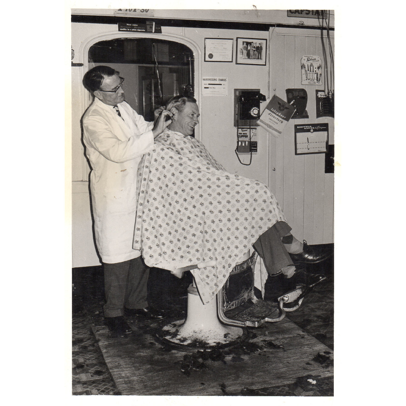 Jim Thomson in his salon, Hansen's building, Williams Street, Kaiapoi