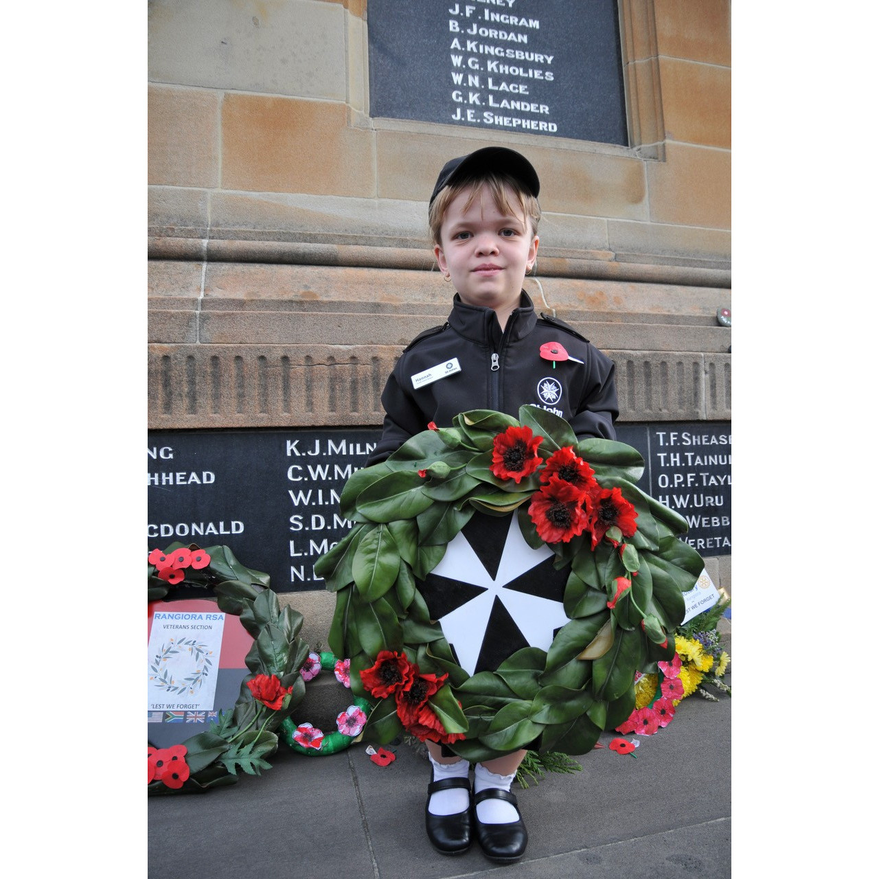 Hannah Weyland-Smith,  St John Ambulance cadet, of Rangiora, wreath bearer for Waimakariri St John at the 2024 Rangiora Anzac Day Service, 2024  