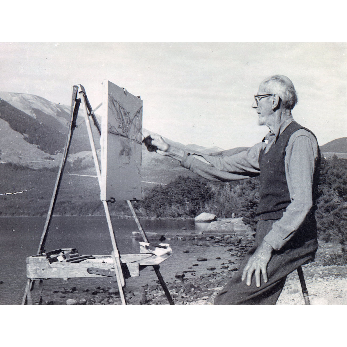 Sydney Lough Thompson 1877-1973 at his easel, possibly at Lake Pearson c.1955