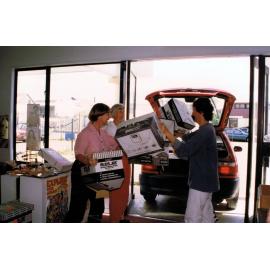 Packing up the temporary Rangiora Public Library on Alfred Street, 4 December 1996