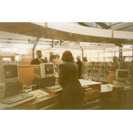 Waimakariri District Mayor Janice Skurr at the front desk of the newly-built Trevor Inch Memorial Library, c. December 1996