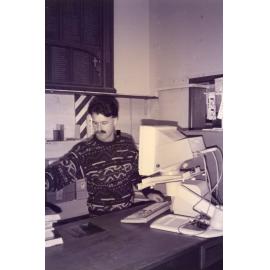 Librarian Richard Shepherd at work in the old Rangiora Public Library, c. 1996
