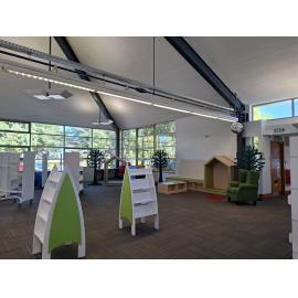 New shelving and fittings being installed in the Trevor Inch Memorial Library children's area, 21 March 2025