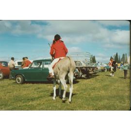 Girl riding a donkey at the Oxford A&P Show