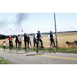 Penny-farthing cyclists during  Millennium Parade, c. 2000