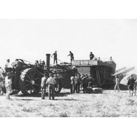 Traction engine and threshing mill