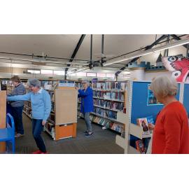 Volunteers shelving at the Rangiora Library, 25 October 2022